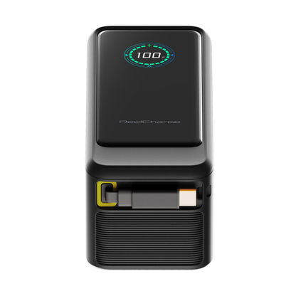Angled view of the ReelPro 67W power bank showing the display and retractable cable bay