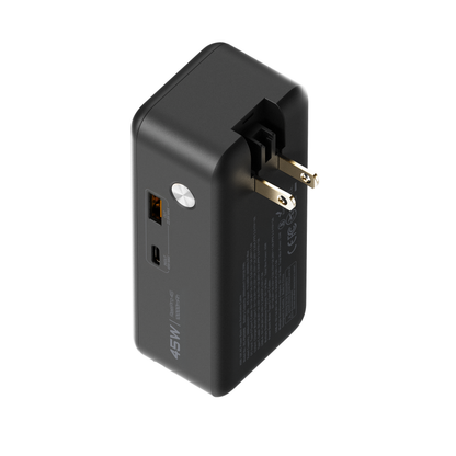 Rear angle of the ReelPro 45W power bank with folding wall prongs extended beside the USB-A and USB-C ports