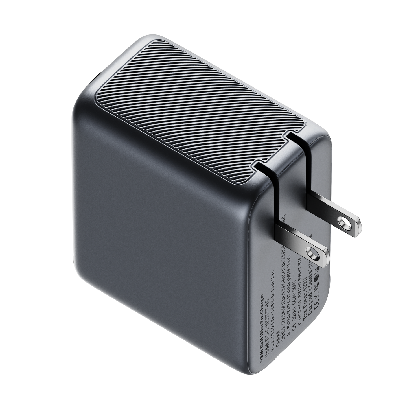 Top view of the ReelCharge 3-in-1 100W charger showing the ribbed housing and folding prongs