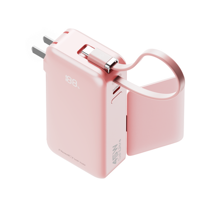 Front view of the pink ReFlextion 45W power bank with folding wall prongs extended for outlet charging