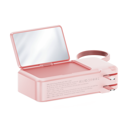 ReelCharge ReFlextion 10,000 mAh power bank in pink with the folding mirror open and USB-C wristlet cable coiled