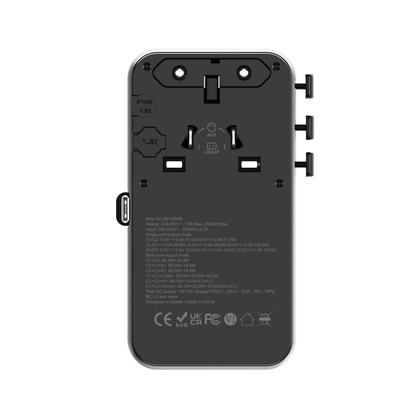 Flat rear view of the ReelCharge 100W travel adapter showing the specification label and prong sliders