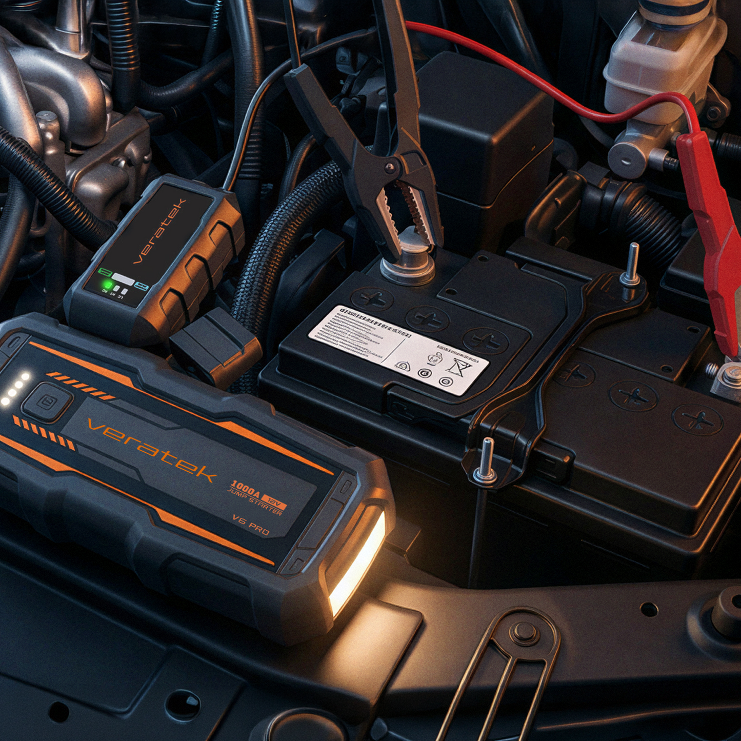 Veratek V6 Pro jump starter clamped to a car battery at night with its LED flashlight lit