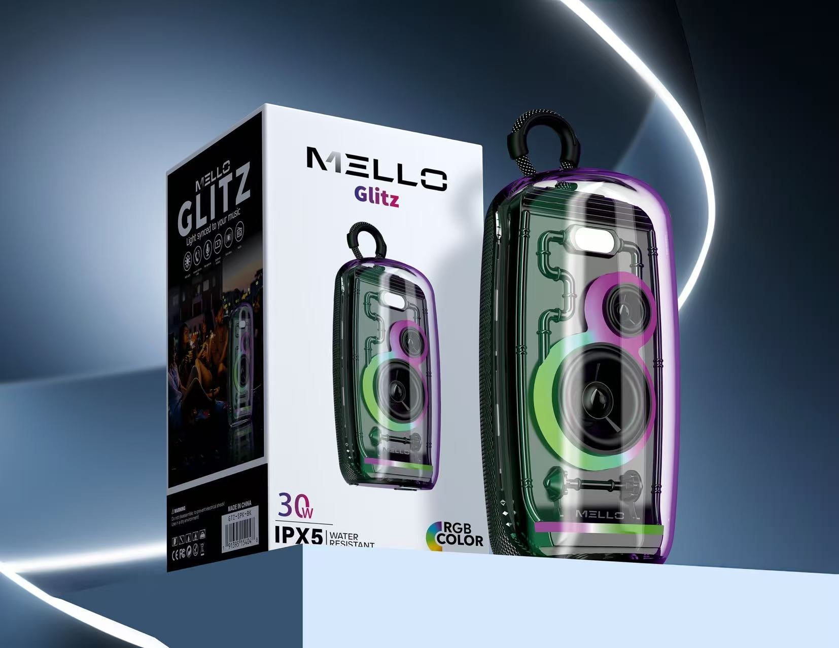 Mello Glitz transparent RGB speaker beside its retail box on a studio backdrop