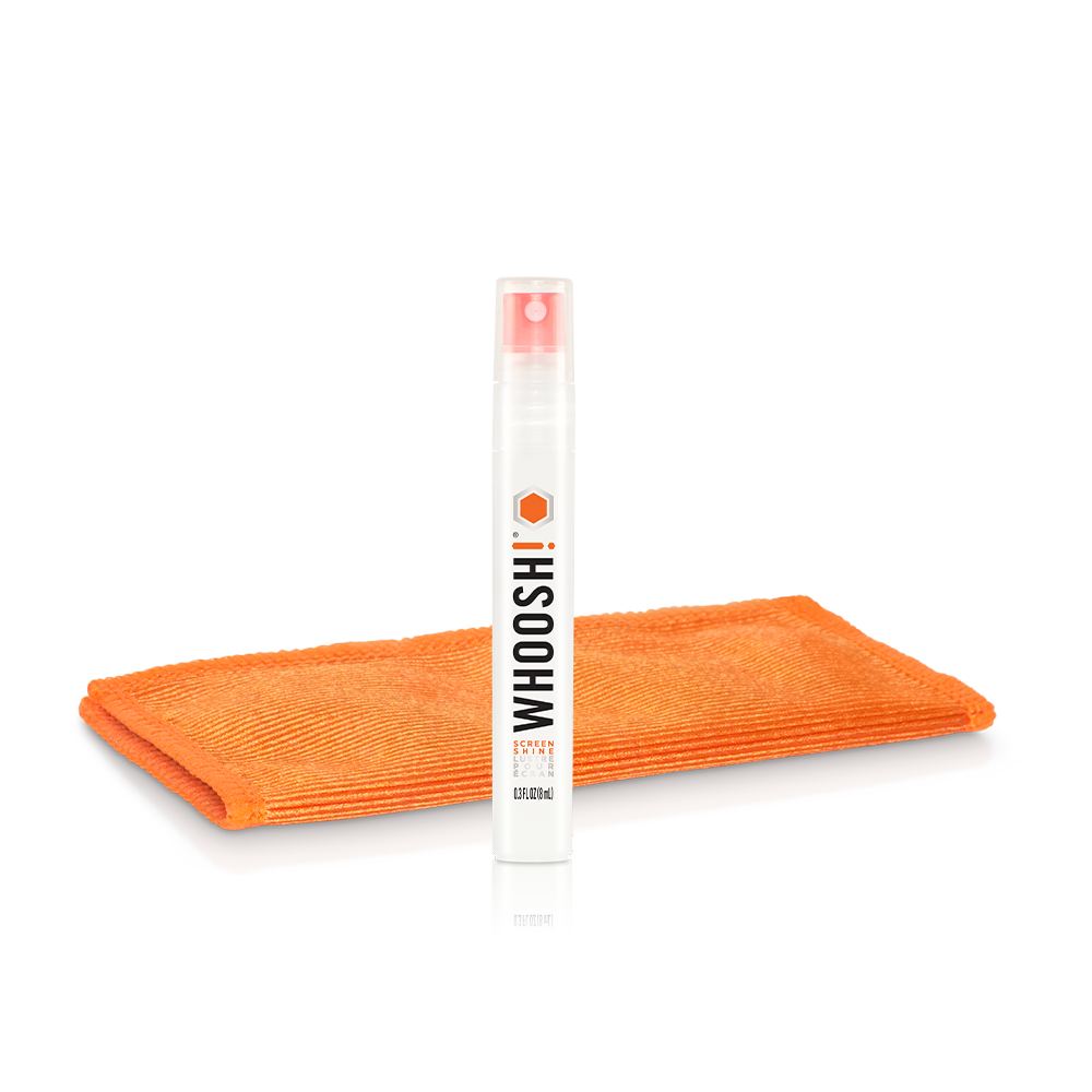Whoosh Screen Shine Pocket pen-size spray standing beside a folded orange microfiber cloth