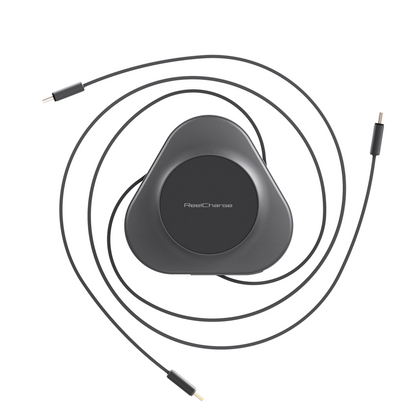 ReelCharge 3-in-1 Universal 100W power station in black with its retractable USB-C cables extended and coiled