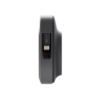 Side profile of the black ReelCharge 100W power station showing the cable bay