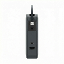 Gray ReelCharge Flex 65W power bank side view showing the LED display, USB-C and USB-A ports