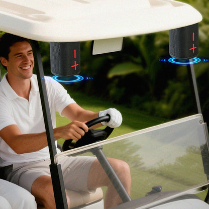 Two halves of the Black Mello Sync magnetic speaker attached to a golf cart roof