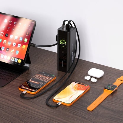 ReelPro 200W power bank on a desk charging an iPad, two phones, earbuds and a smartwatch at once