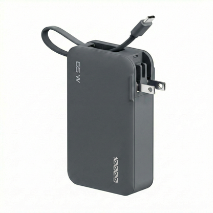 ReelCharge Flex 65W 10,000 mAh power bank in gray with integrated USB-C cable and folding wall prongs