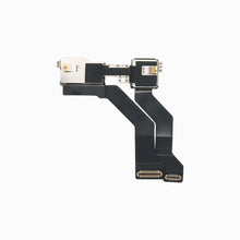 Back of iPhone 13 front camera flex assembly showing metal shields and board connectors