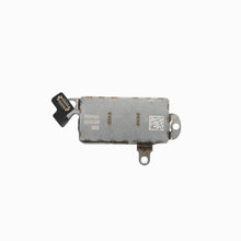 Back of iPhone 13 Pro Max Taptic Engine vibration motor showing metal housing and flex connector