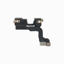 Back of iPhone 14 front camera module showing mounting brackets and flex cable connectors