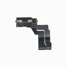 Back of the iPhone 14 Pro front camera module showing bracket and dual flex cable connectors