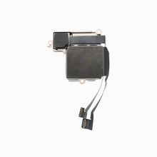 Back of the iPhone 15 Plus rear camera module showing the metal shield and flex connectors