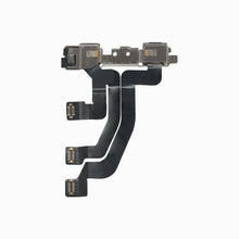 iPhone XS Max front camera flex assembly from behind, showing shields and three flex connectors