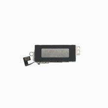 Reverse side of iPhone XS vibration motor showing flex connector and mounting bracket
