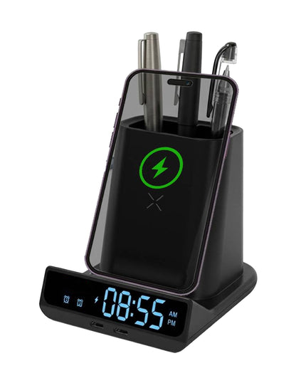 POM Desk Charge Pro charging an iPhone leaned against the pen holder, pens inside