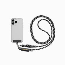 Black weave PISEN braided lanyard attached to a clear phone case via the anchor patch and clip