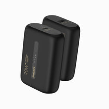 Two black PISEN Power Tiny 20W 10000mAh mini power banks, angled views showing ports and indicator lights