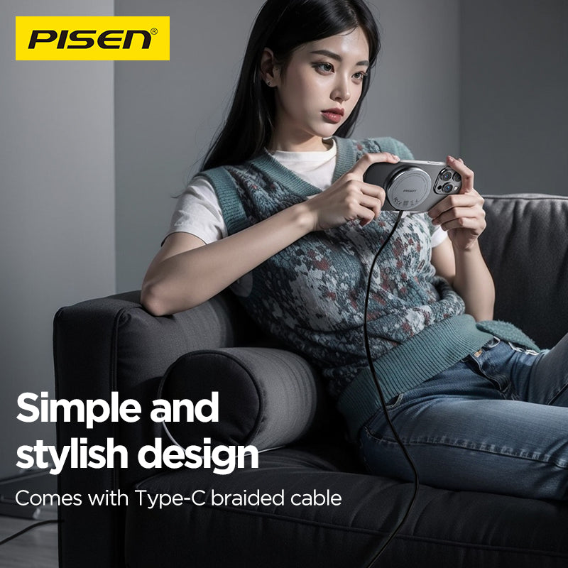 Person on a couch using a phone with the PISEN TP-C56 magnetic wireless charging pad and braided cable attached