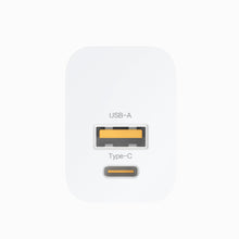 Close-up of PISEN QUICK 30W wall charger TS-C171 showing labeled USB-A and Type-C output ports