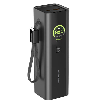 ReelCharge ReelPro 165W 20,000 mAh power bank in black with a color display showing 86 percent and a wrist strap